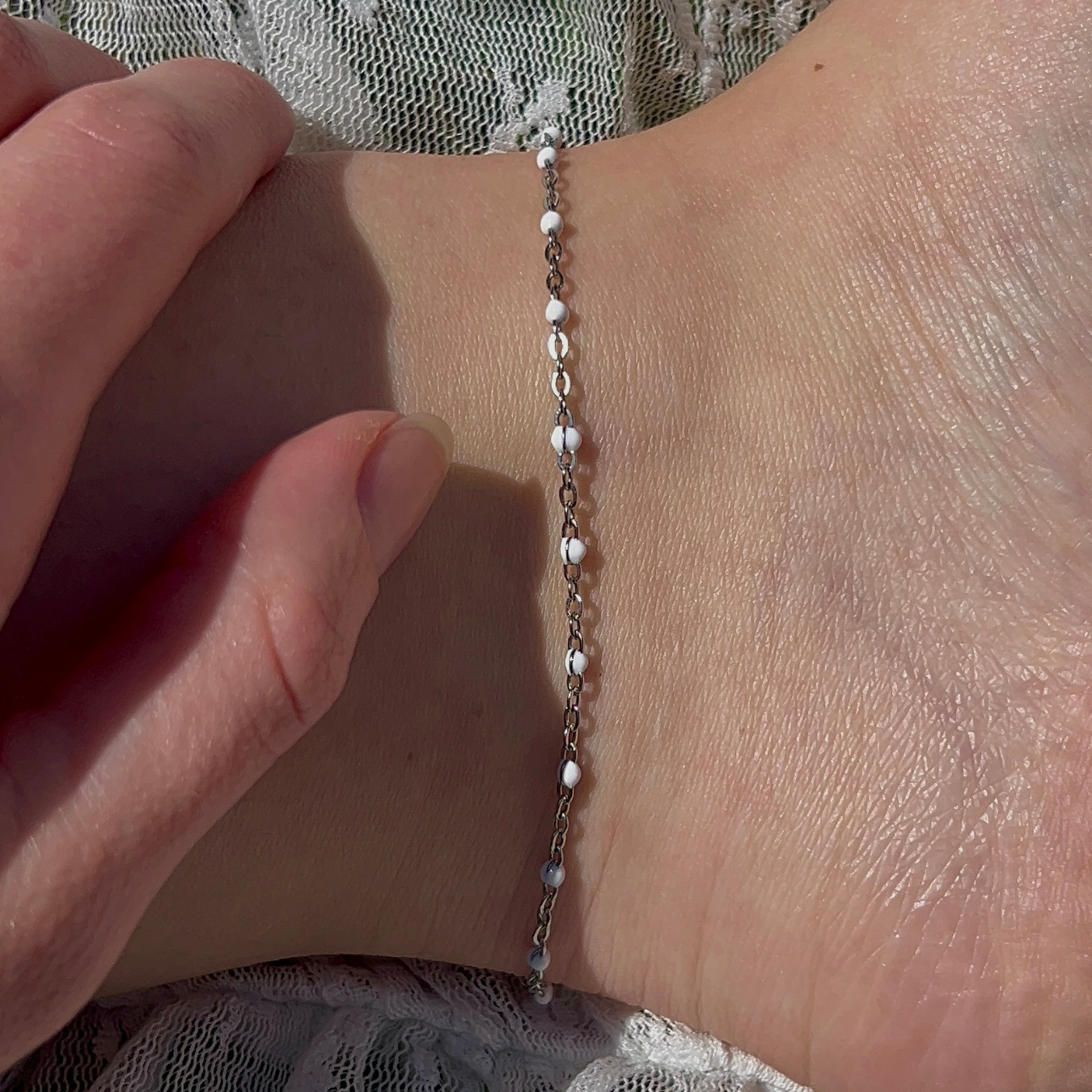 chaîne de cheville blanche en acier inoxydable argenté