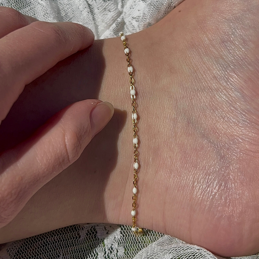 chaîne de cheville blanche en acier inoxydable doré